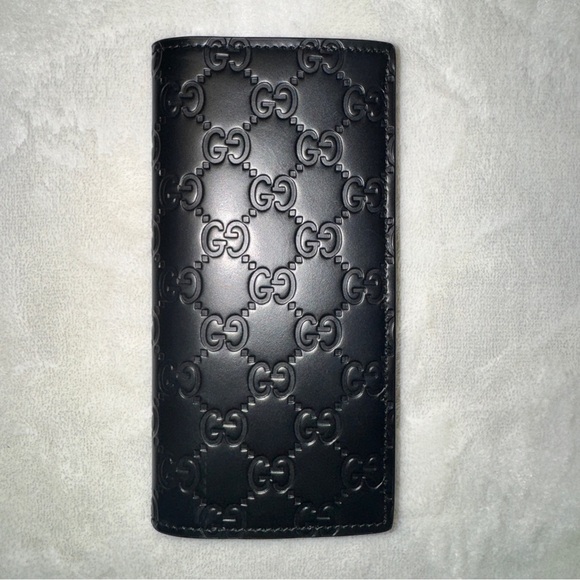 Gucci Black GG Embossed Wallet - Picture 1 of 6